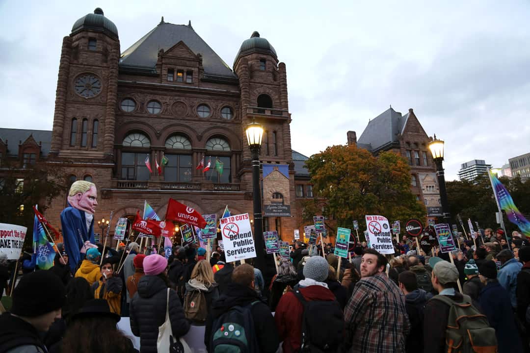 Labour group protests repeal of workplace legislation at Queen’s Park. SHANNA HUNTER/THE VARSITY